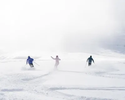 Skiers and snowboarders enjoy a Banff Sunshine Village powder day