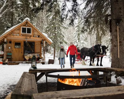 Smithers BC sleigh ridge couple fire cabin