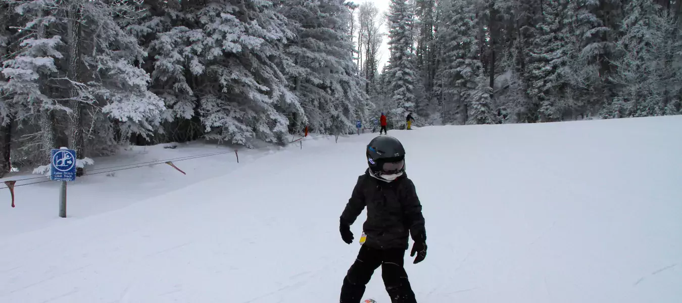 Skiing kid