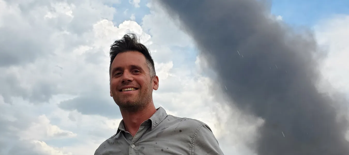 Kyle Brittain, Alberta weather specialist Kyle Brittain, Alberta weather specialist with tornado in background