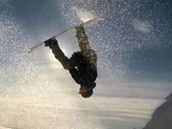 daxjustin-snowseekers- Sun Flare Backflip snowboarder British Columbia Alberta