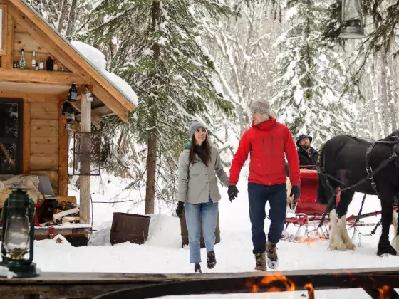 Smithers BC sleigh ridge couple fire cabin