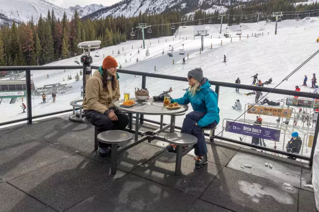 Enjoying lunch on the upper deck at the main lodge at Marmot Basin, Jasper, AB, Canada