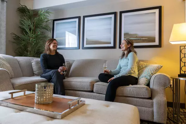Two people enjoying a glass of wine in Vermillion