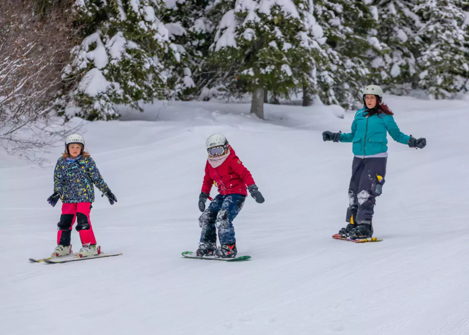 Cruising the slopes on snowboards at Whispering Pines. Whispering Pines Ski Area Clear Hills County AB Paul Lavoie