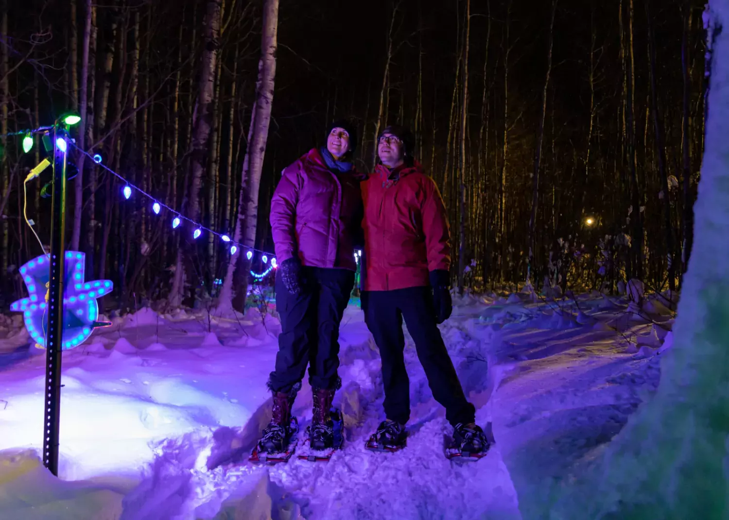 Trails are lit for night time snowshoe adventures at Nitehawk. / Paul Lavoie Night snowshoeing Nitehawk Grande Prairie AB Paul Lavoie