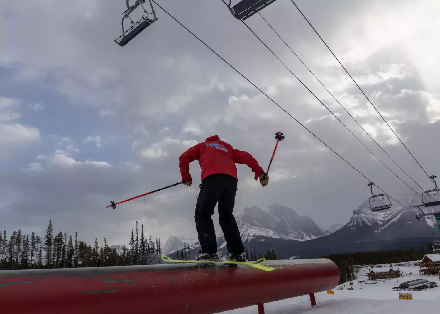 Armstrong demonstrates technique for sliding a tube. / Paul Lavoie skiing pipe terrain park Lake Louise AB