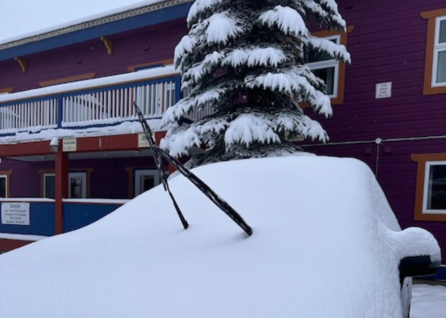 Car buried under snow at SilverStar